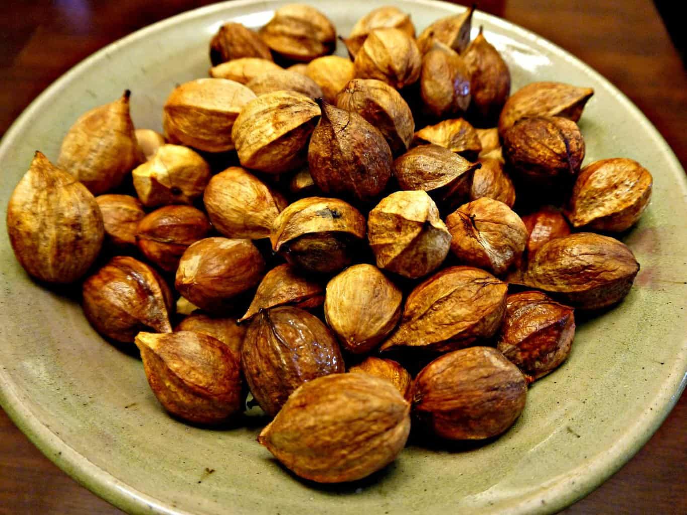 First fold of melon cage From recipe hickory nut ambrosia: picture of hickory nuts de-husked in bowl