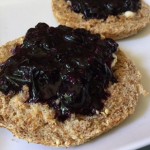 Yum! Garden hucklberry preserves on whole grain English muffin with local grass-fed butter.