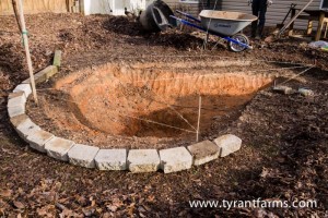 leveling the outer wall of the pond