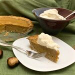 American persimmon pie with chestnut flour crust and maple whipped cream